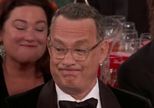 Tom Hanks' Golden Globe Grimace: blank meme template