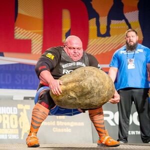 Man Lifting Giant Stone: blank meme template